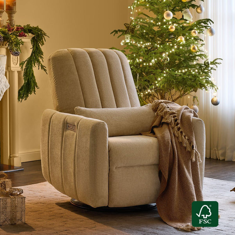 Sand chenille nursery glider recliner with power swivel, lumbar pillow, and festive holiday decor.