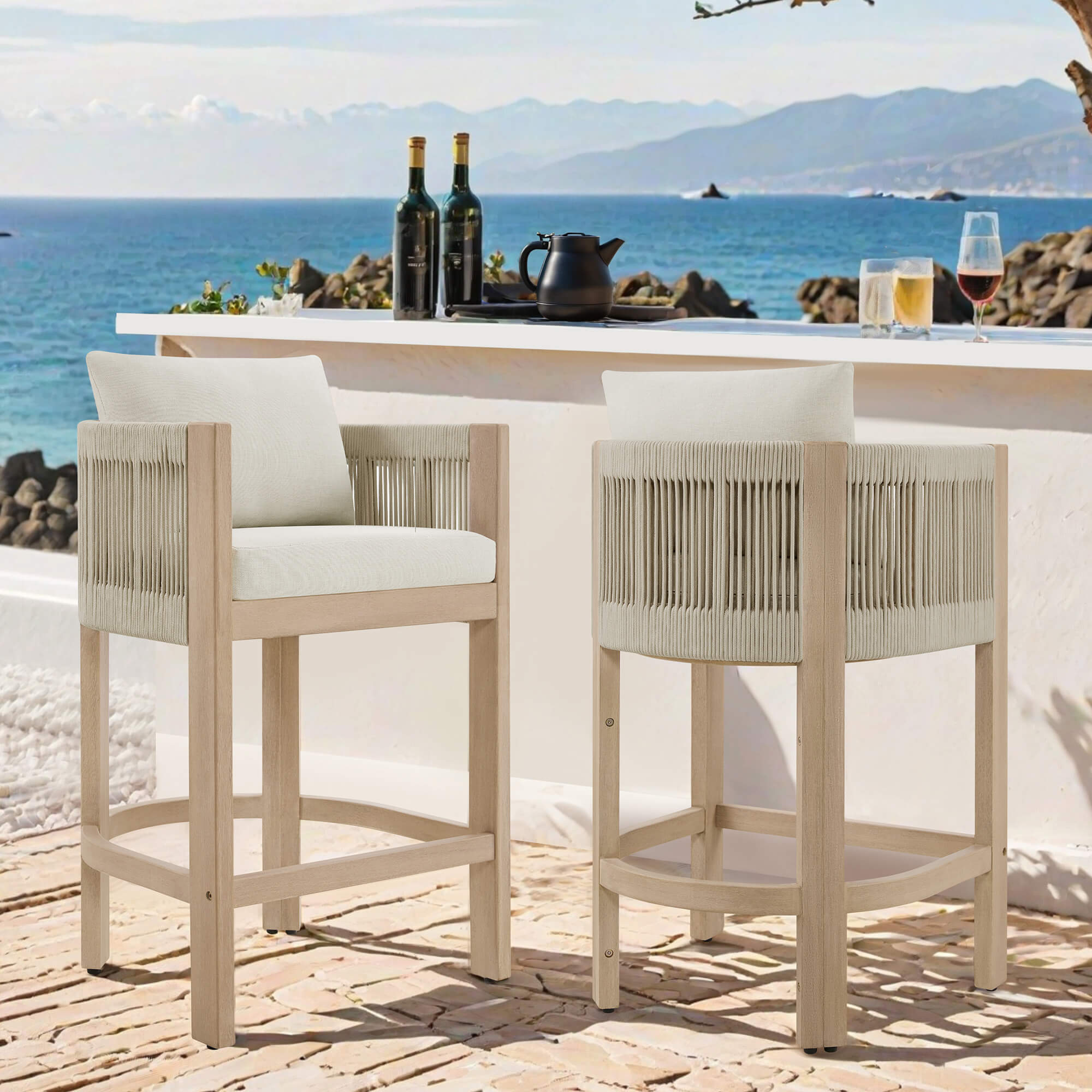 Clover Boho acacia wood counter stools with rope detailing and cushioned seats on ocean-view patio.