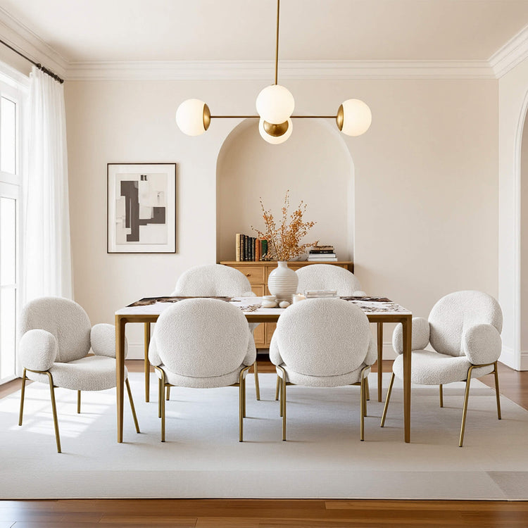 Cream Teddy Boucle Janet Cloud-Shaped Dining Chairs with champagne gold legs.