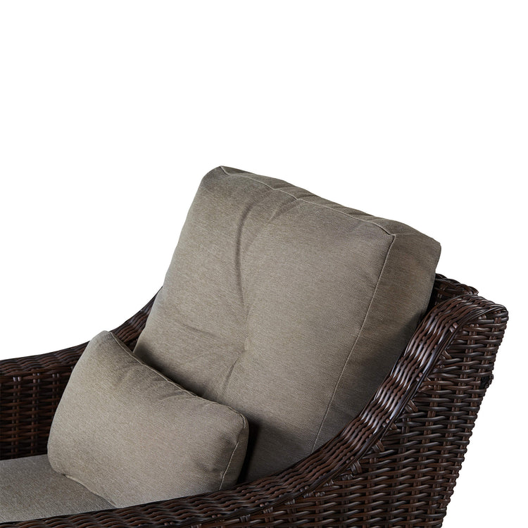 Brown rattan lounge chair with plush gray cushions, perfect for outdoor relaxation - CHITA Living