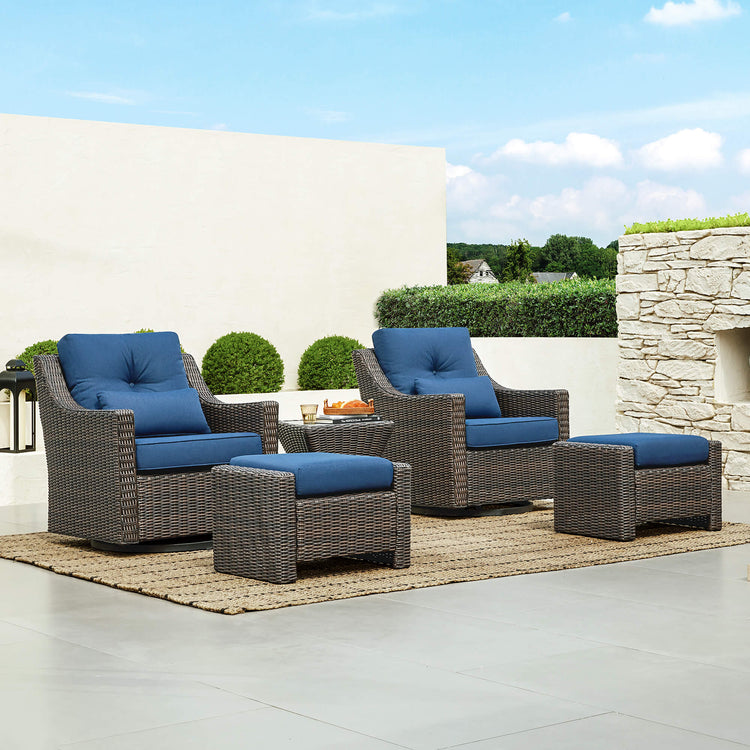 Stylish rattan chairs with blue cushions in outdoor patio setting - CHITA Living