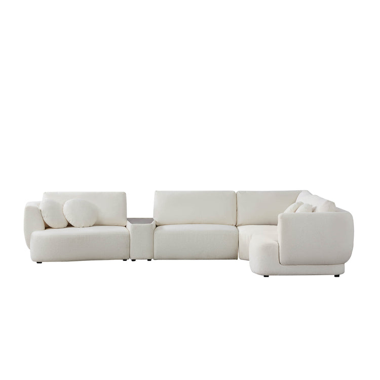 Grace modular curved sofa in light boucle fabric with walnut console in modern living room - CHITA Living