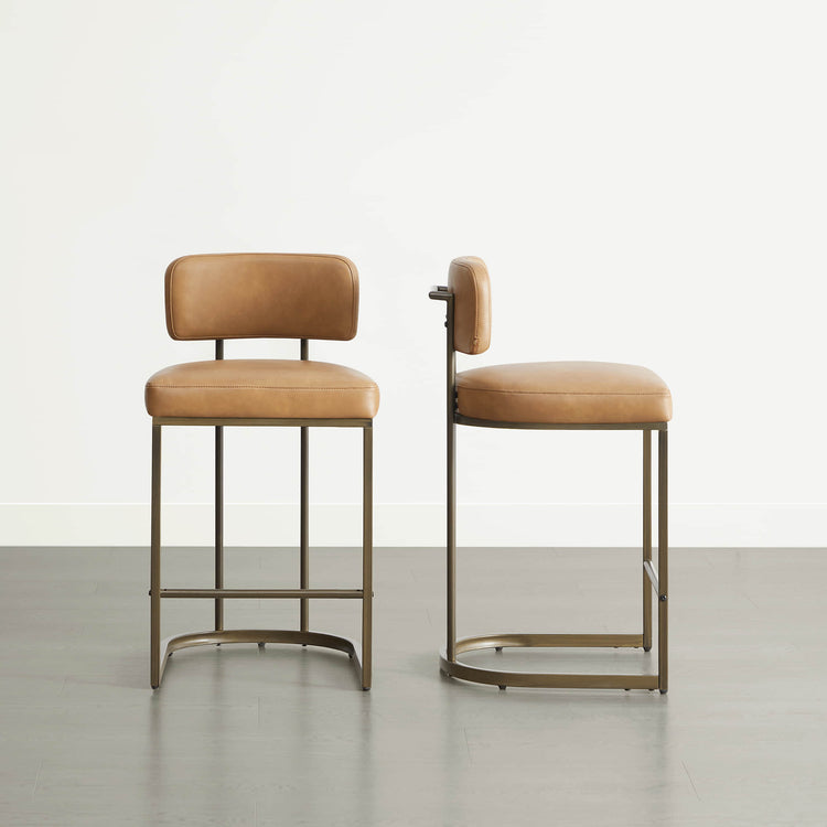 Contemporary leather bar stools with supportive backrests, designed for comfort and style.