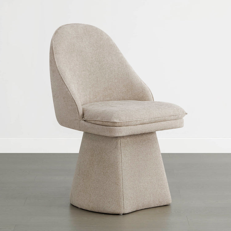 Modern beige swivel chair, perfect for stylish dining spaces.