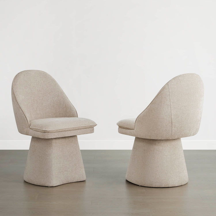 Beige swivel chairs with modern design, perfect for stylish dining spaces.