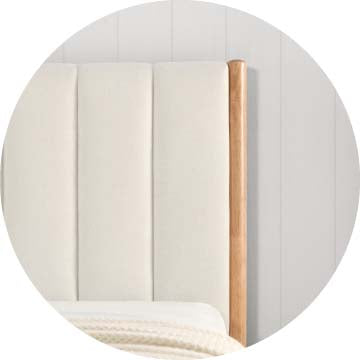 Cream upholstered queen-size bed headboard with natural wood accents - CHITA Living