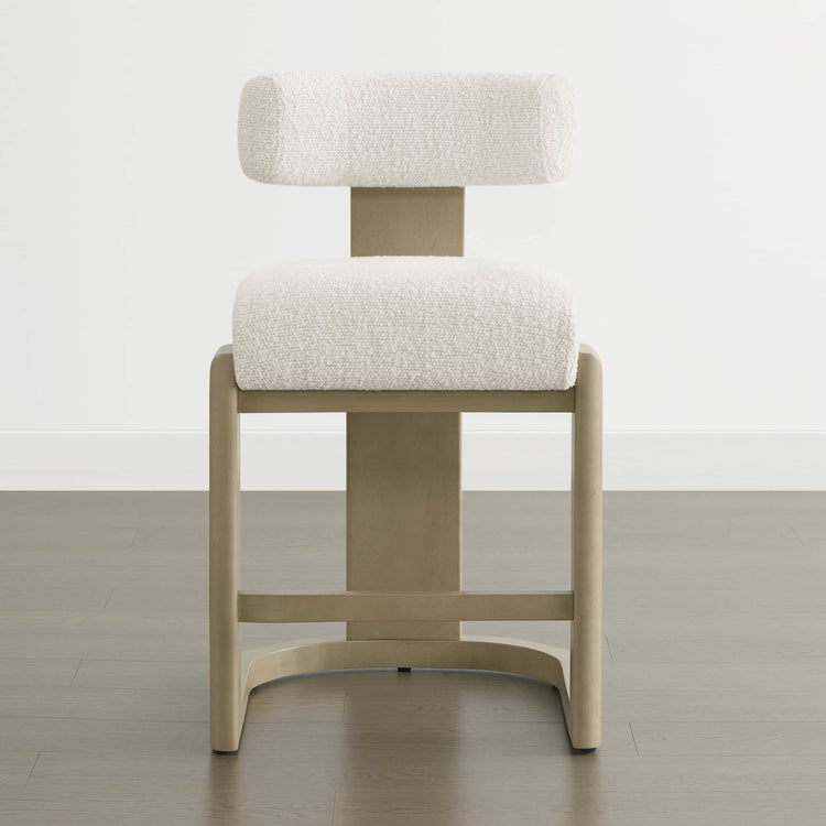 Troy Boucle Counter Stools with solid wood frames and white upholstered seats offer a sleek, modern design for stylish seating.
