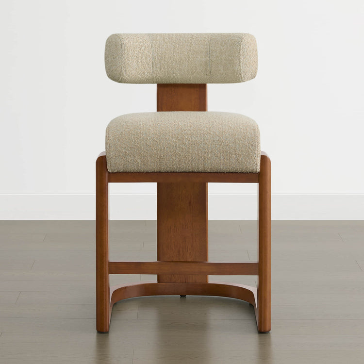 Troy Boucle Counter Stools feature solid wood frames with a beige upholstered seat and backrest, offering modern elegance.