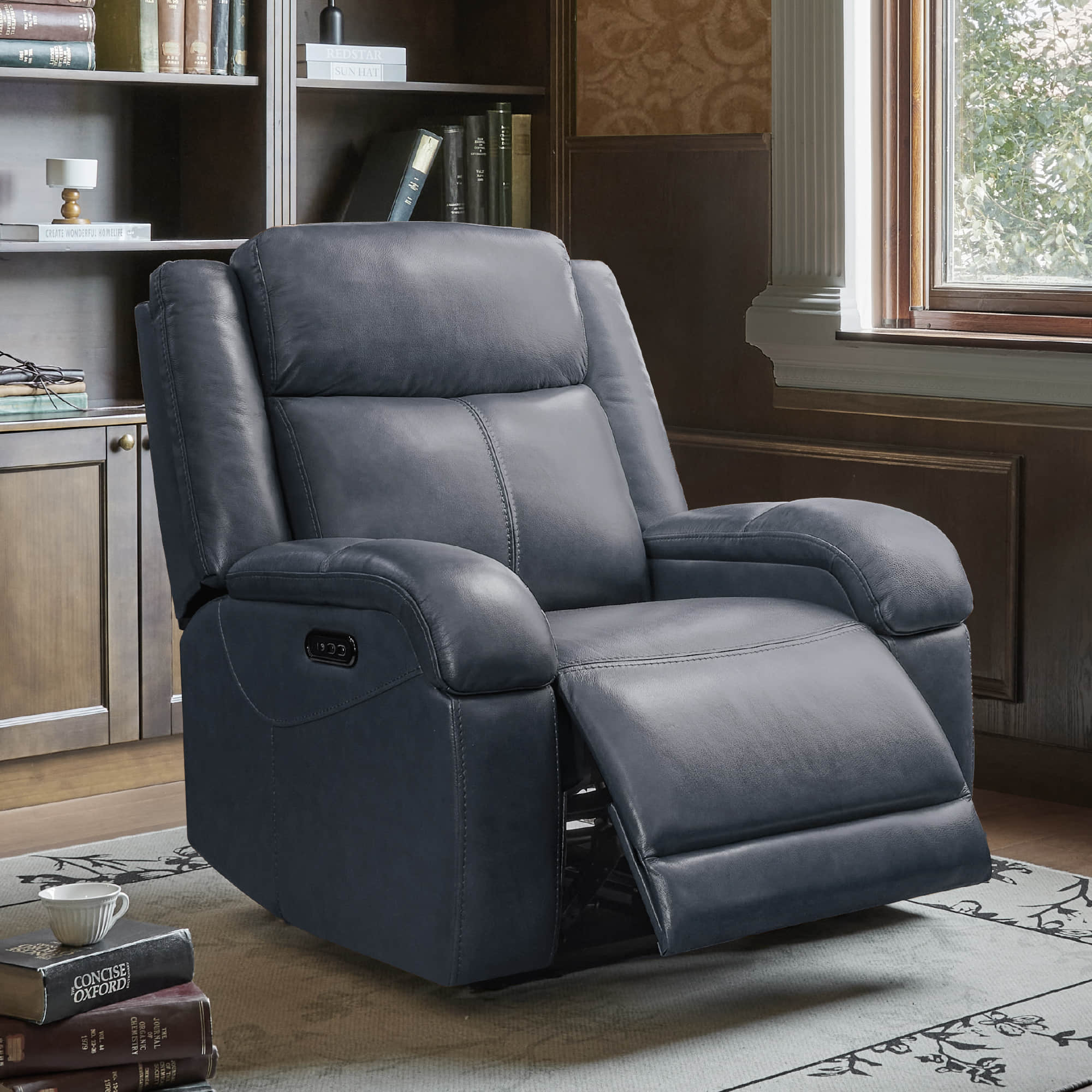 Charcoal grey Isaac Wall Hugger recliner with power recline and headrest in a stylish living room - CHITA Living