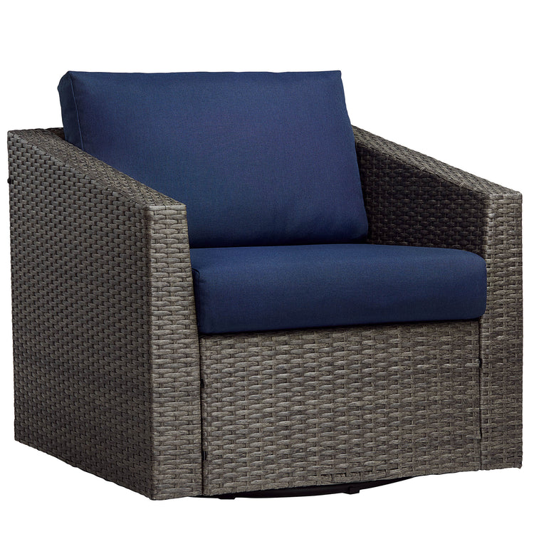 Calum Rattan Outdoor Swivel Accent Chair with navy cushion, ideal for outdoor relaxation - CHITA Living