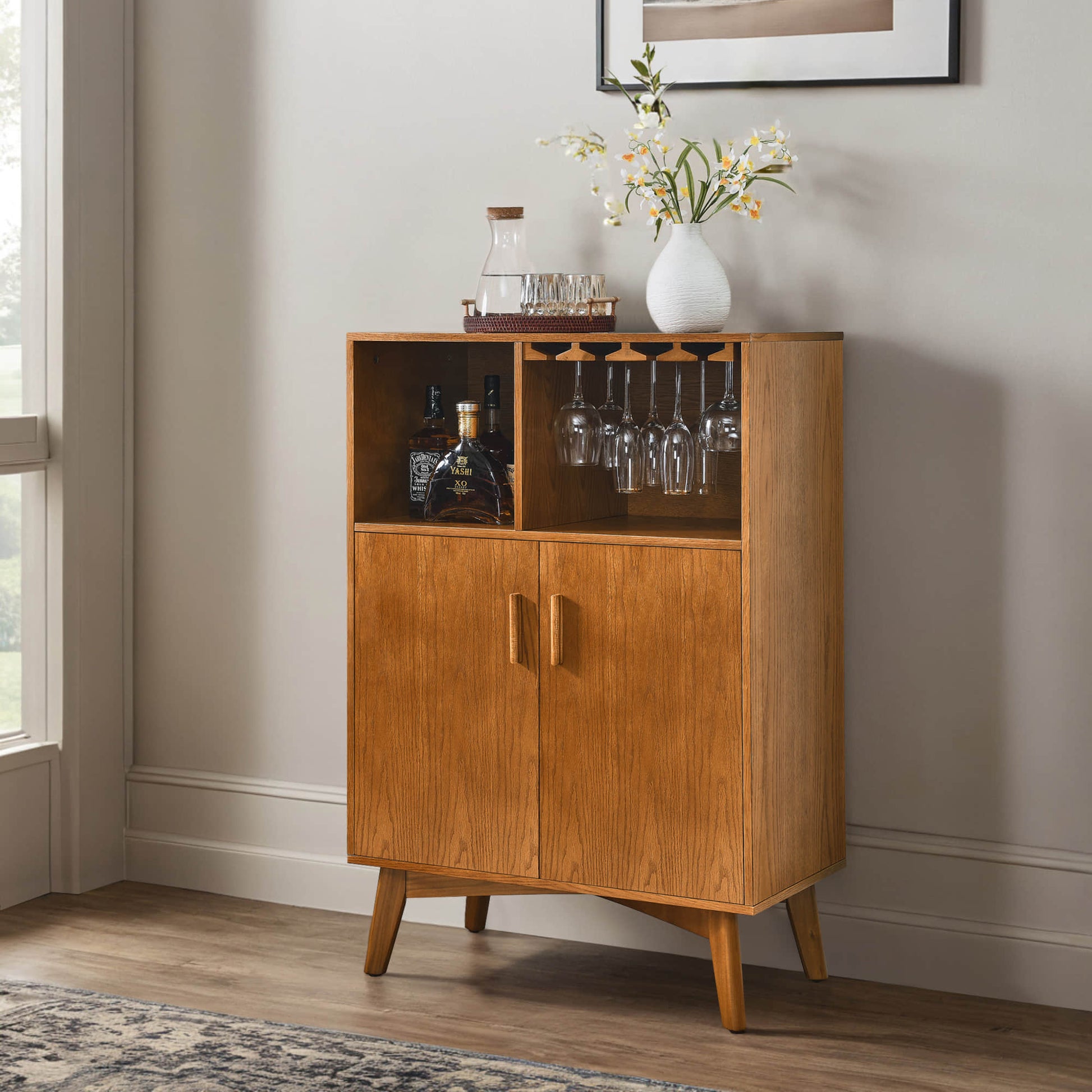 Mid-century modern oak wine cabinet with glass holder, wine rack, and storage, ideal for home bar and dining areas.