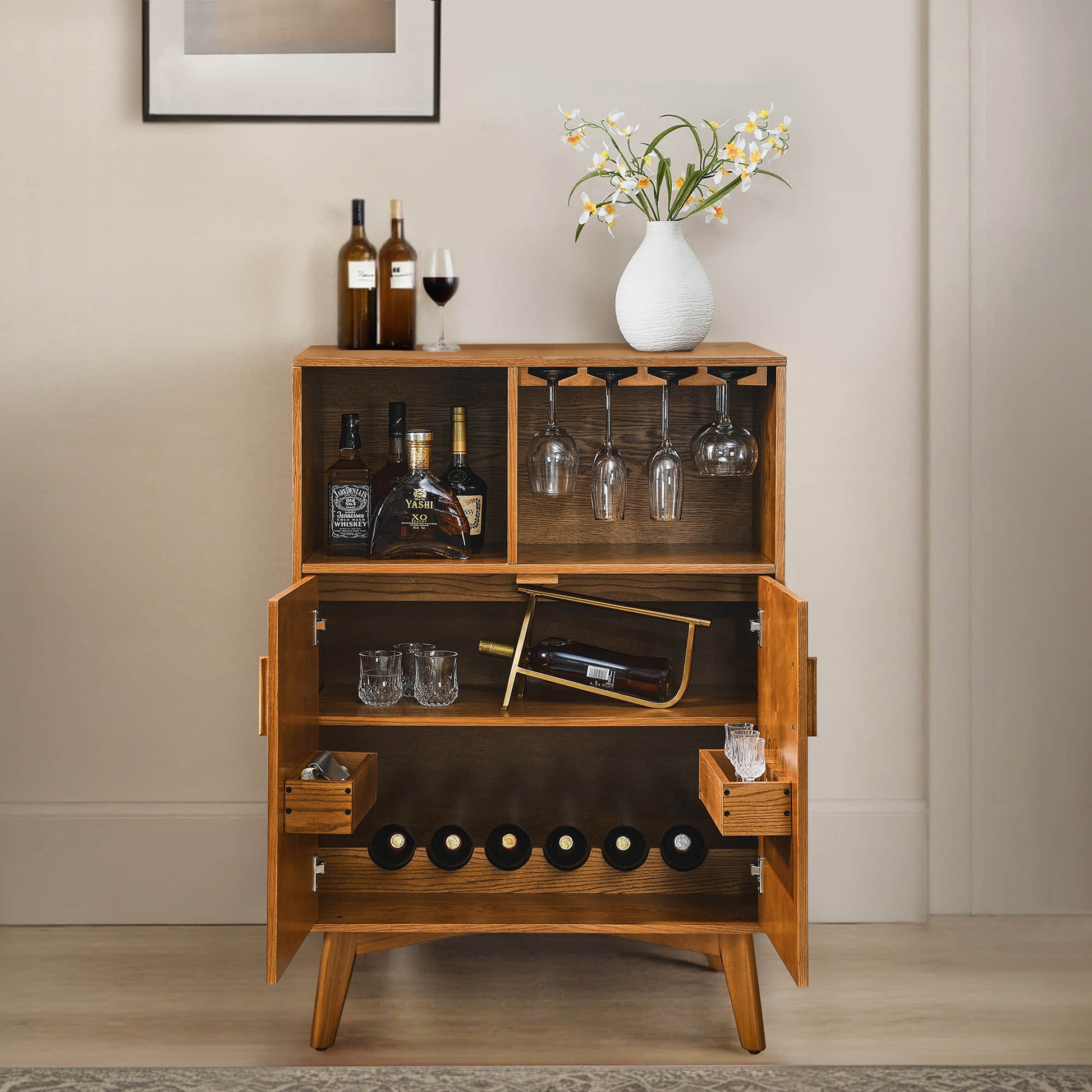 Mid-century wooden wine cabinet with wine glass holder. Features stylish storage for home and bar.
