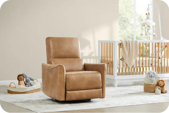 A cozy nursery with a brown leather recliner