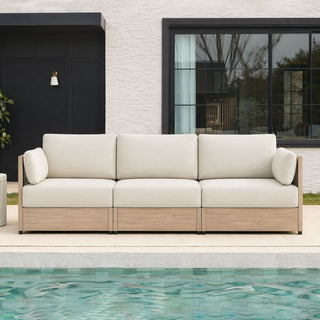 A broad front-porch scene shows how outdoor seating can create a comfortable zone without blocking the route to the door.