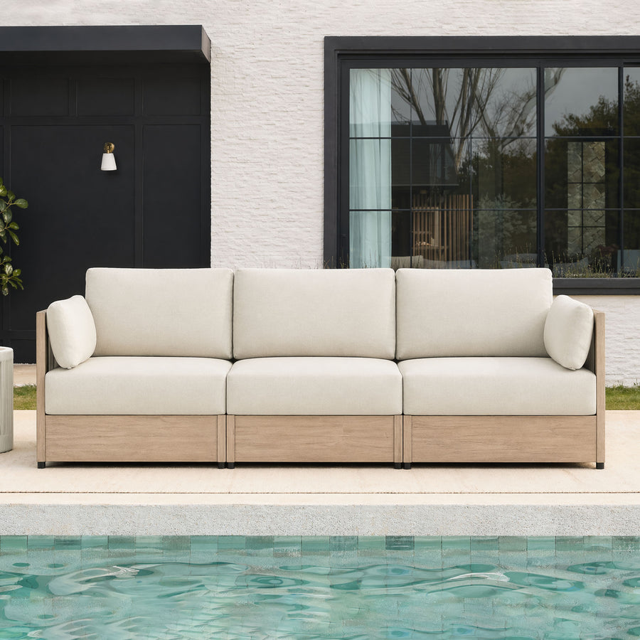 A broad front-porch scene shows how outdoor seating can create a comfortable zone without blocking the route to the door.