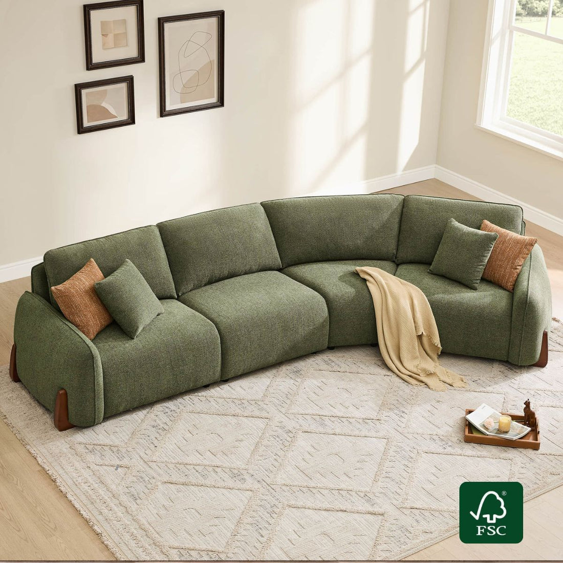 Teleri 4-seat Modular Curved Sofa with Wood Leg - Teleri 4-seat modular curved sofa in green with wood legs, plush cushions, and accent pillows on a patterned rug.