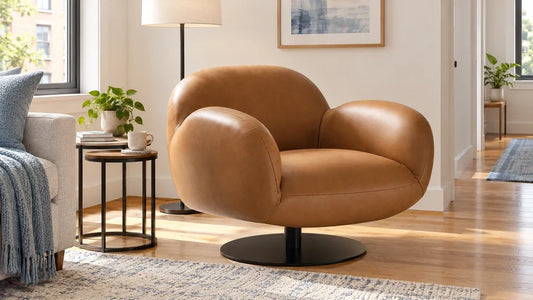 Brown Cloud Puffy swivel chair beside nesting tables in a compact apartment living area.