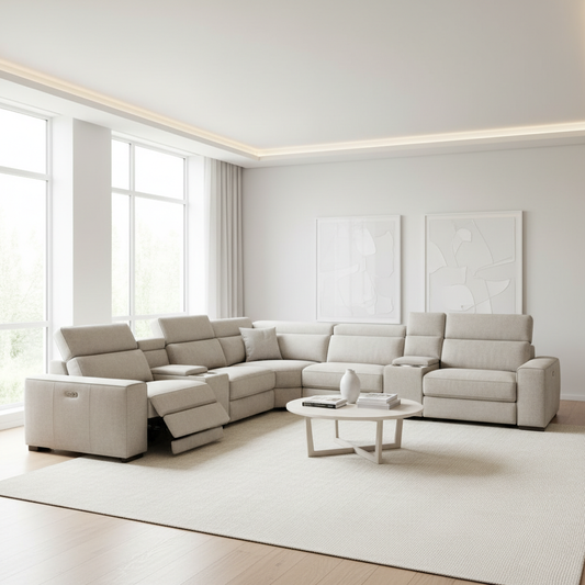 A luxurious modern living room featuring a sleek, low-profile Haley modular power reclining sectional in neutral performance fabric, showcasing a contemporary L-shaped layout with invisible reclining technology.