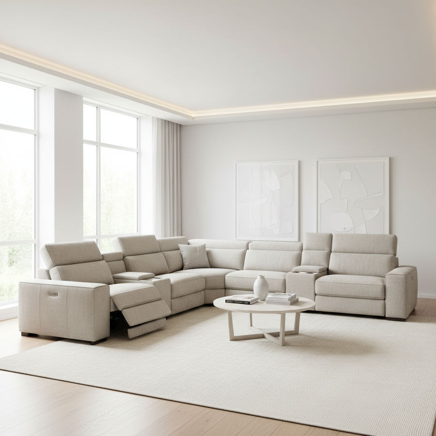 A luxurious modern living room featuring a sleek, low-profile Haley modular power reclining sectional in neutral performance fabric, showcasing a contemporary L-shaped layout with invisible reclining technology.