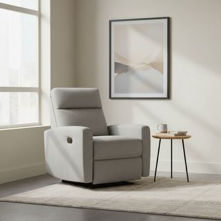 A modern wall-hugger power recliner in a compact, stylish apartment living room, positioned close to the wall.