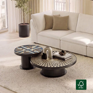 Nesting tables shown as flexible living-room furniture beside seating