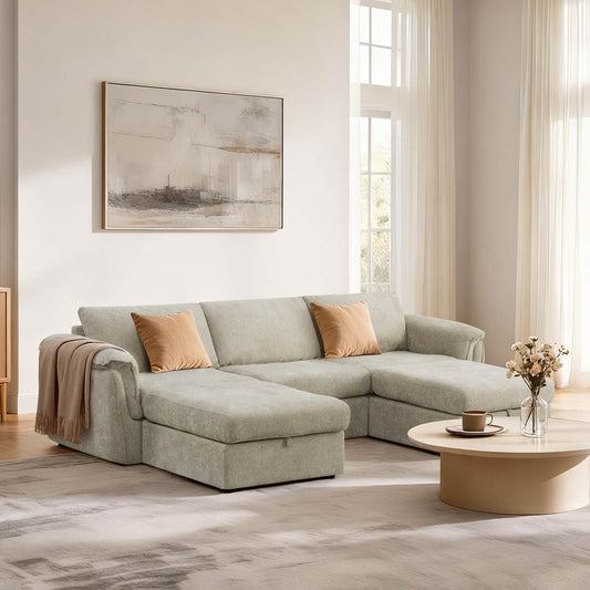 Light gray sectional sofa with orange pillows in a bright, modern living room.