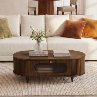 Editorial hero image showing how a coffee table can anchor family board-game play while preserving living-room circulation.