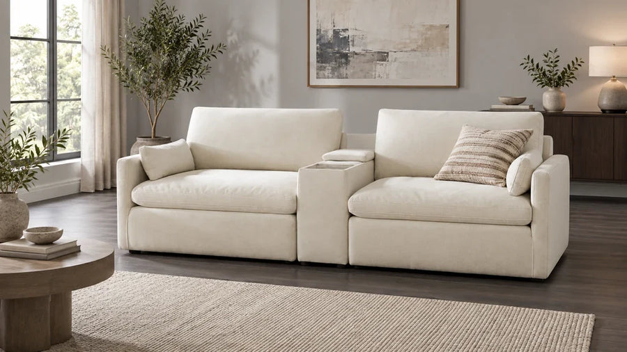 Cream Kenna modular sofa with aligned seats on a dark wood floor.