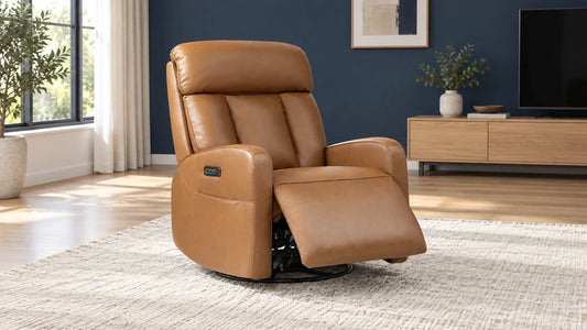 Tan Maxwell swivel recliner with its footrest extended in a living room with a blue wall