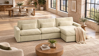 A cream Ivy sectional defining a living area with a clear route to the dining table