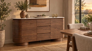 Todd walnut sideboard with serving dishes in a dining room
