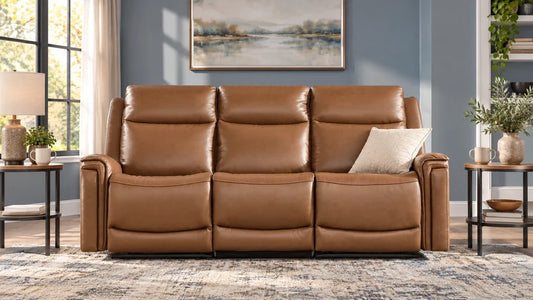 Brown three-seat Leif reclining sofa with side tables in a blue-gray living room