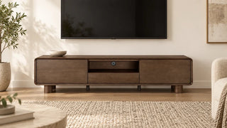 Dark oak Eason media console beneath a wall-mounted television