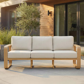 Hero image for an article about choosing outdoor furniture for rainy climates.