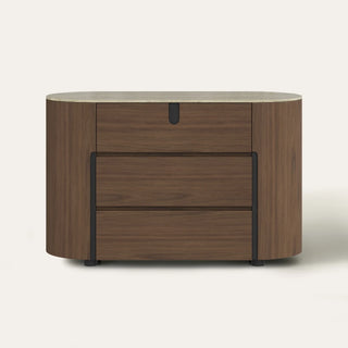 Three-drawer dresser presented in a bedroom setting for evaluating drawer construction and overall design.