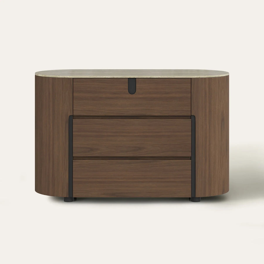 Three-drawer dresser presented in a bedroom setting for evaluating drawer construction and overall design.