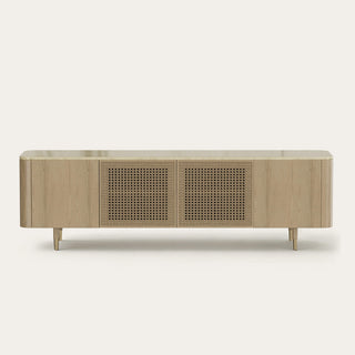 The woven cabinet doors provide a recognizable furniture example for the cleaning instructions.