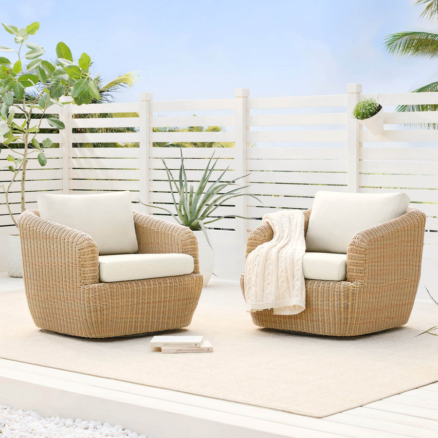 An outdoor conversation set sits on a patio near a roof edge during light rain, illustrating how direct rain, splashback, and shelter affect furniture placement.