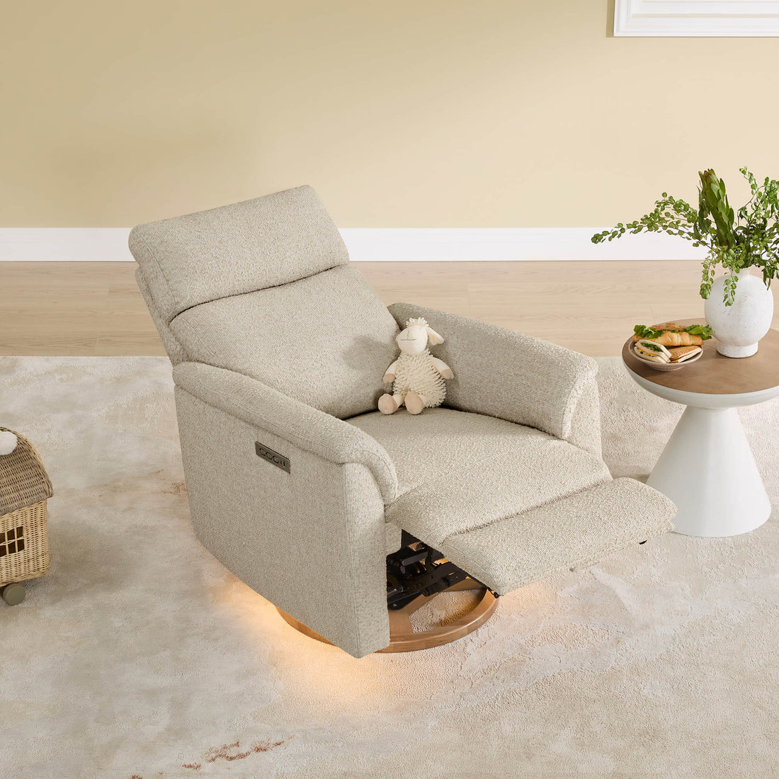 Lulla Power Swivel Nursery Glider Recliner with Power Headrest and Nightlight - Cream Lulla nursery glider recliner with power headrest, USB ports, and nightlight in a nursery setting.