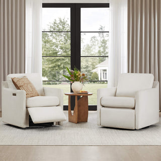 Henry Swivel Accent Chair with Electric Footrests & Charging Ports - Two Henry Power Swivel Recliner chairs in a bright room with a large window.