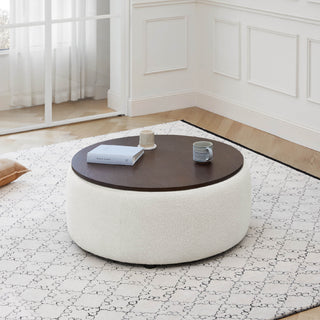 Upholstered ottoman shown beside a sofa in a modern living room