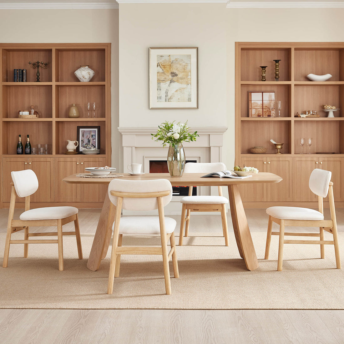 Modern dining room featuring round wooden table with upholstered chairs, built-in oak shelving, and fireplace creating warm family gathering space