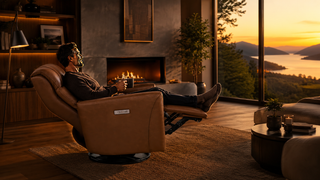 Leather recliner beside a fireplace with scenic view