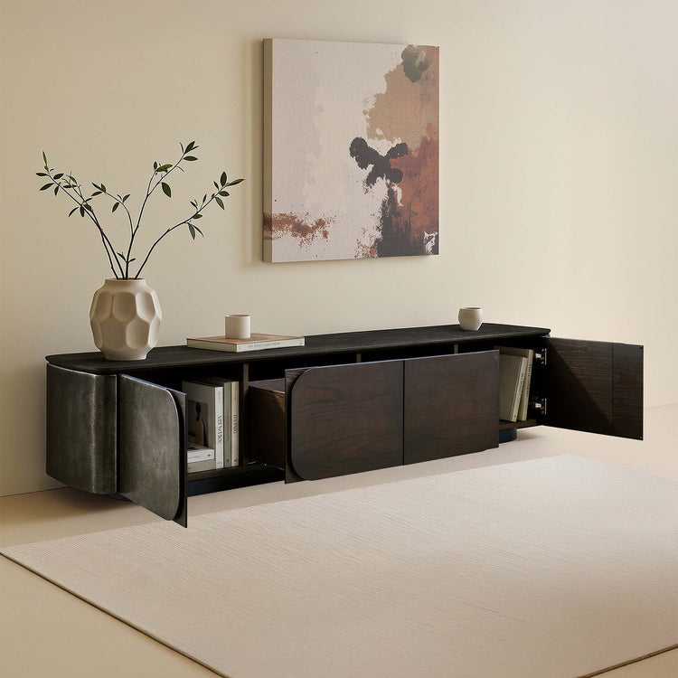 Modern Scandinavian 79" Samuel dark ash wood media console with rounded doors and storage.