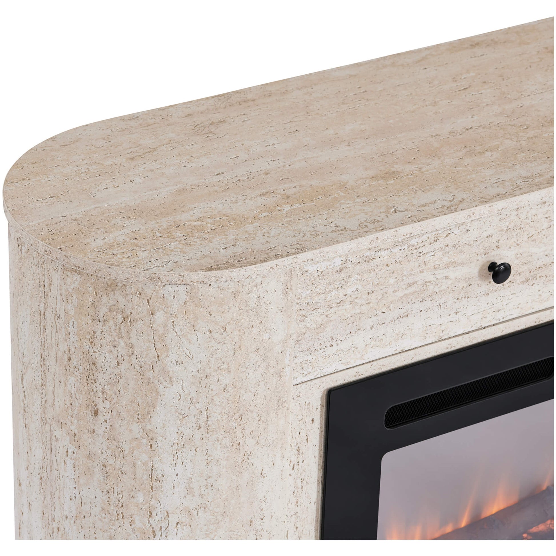 Close-up of the curved corner of a travertine fireplace sideboard with a black drawer pull.
