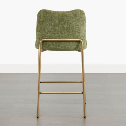 Green upholstered modern barstool with gold metal base and curved backrest