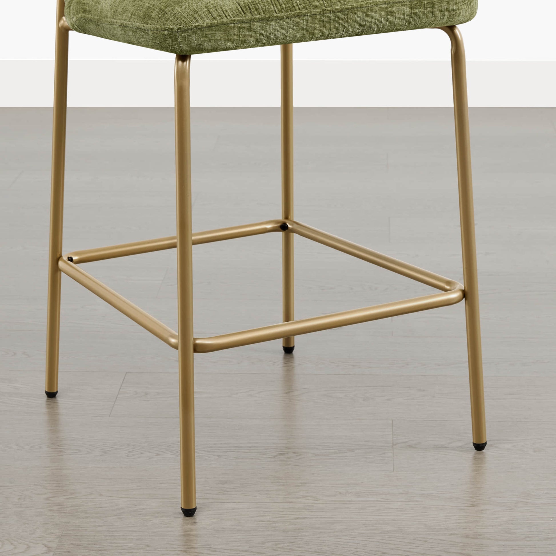 Amalia modern metal base barstool with gold frame and green upholstered seat