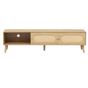 Front view of light wood tv stand with rattan doors & dark shelf.