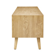 Side close-up view of light wood tv stand, showcasing grain detail.