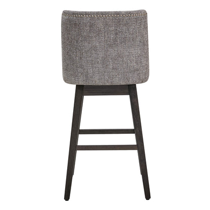 Back view of gray Asher swivel bar stool with silver nailhead trim on black wooden legs - CHITA Living